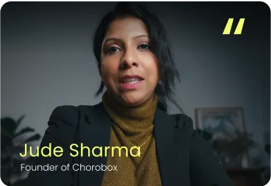 Portrait of Jude Sharma, founder of Chorobox, speaking in a dimly lit room.